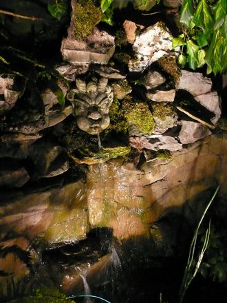 The water cascade at night.