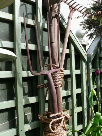 A sculpture from old garden tools.