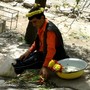 Armenian man making garlands and posies from local wild flowers that grow in this mountainous area.