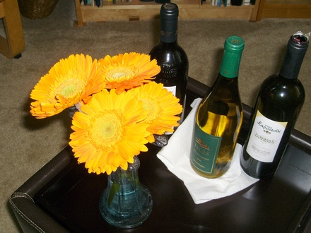 gifts of wine and daisies