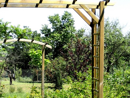 View of lower garden looking through two arches