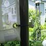 New grommets on the patio shade cover.