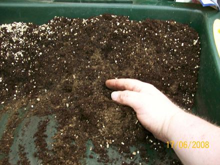 Mixing the compost