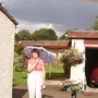 Mum & Birtie coming in from the rain