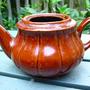 Teapot with broken lid