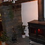 The log burner in the sitting room (Rosmarinus officinalis (Rosemary))