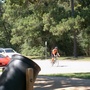 Cyclists on the other side of the park.